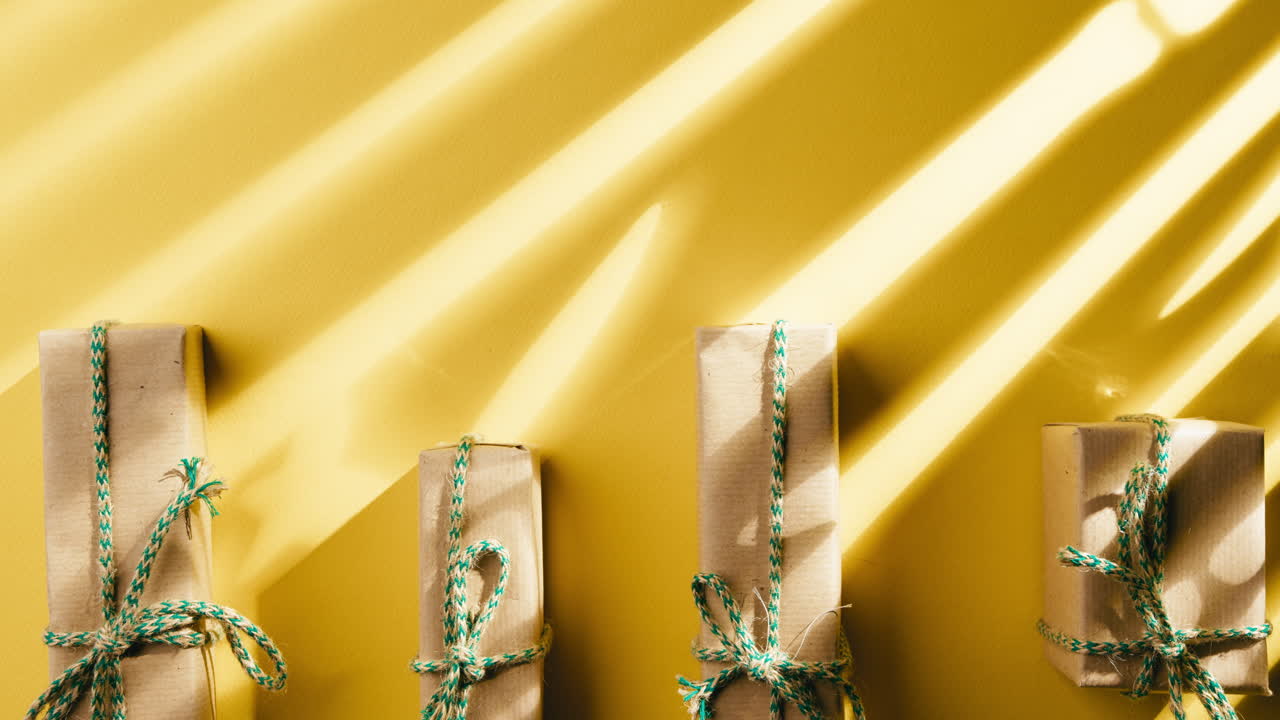 Christmas gifts and shopping cart passing by on yellow background, Black Friday