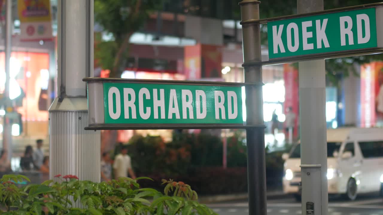 Street signs on Orchard and Koek Rd