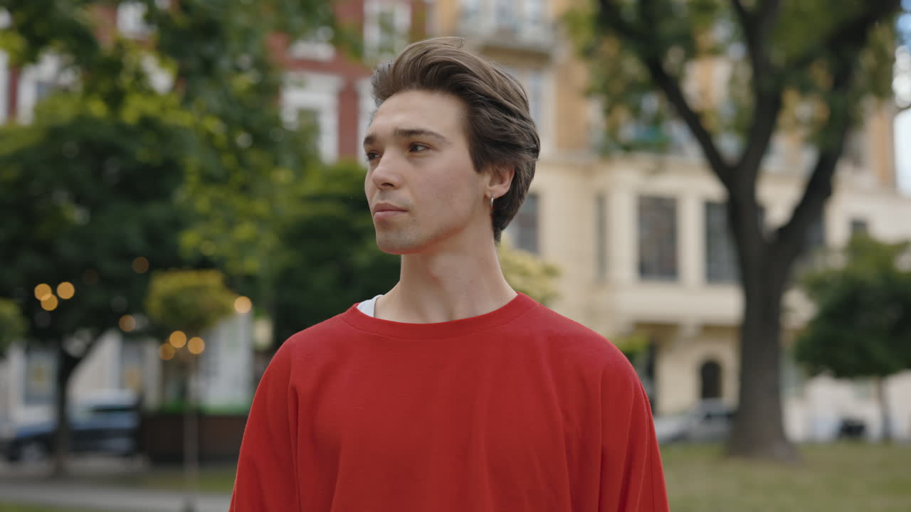 Portrait of a man in a red sweater
