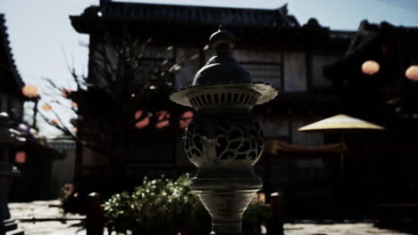 ornate incense burner in a traditional asian garden