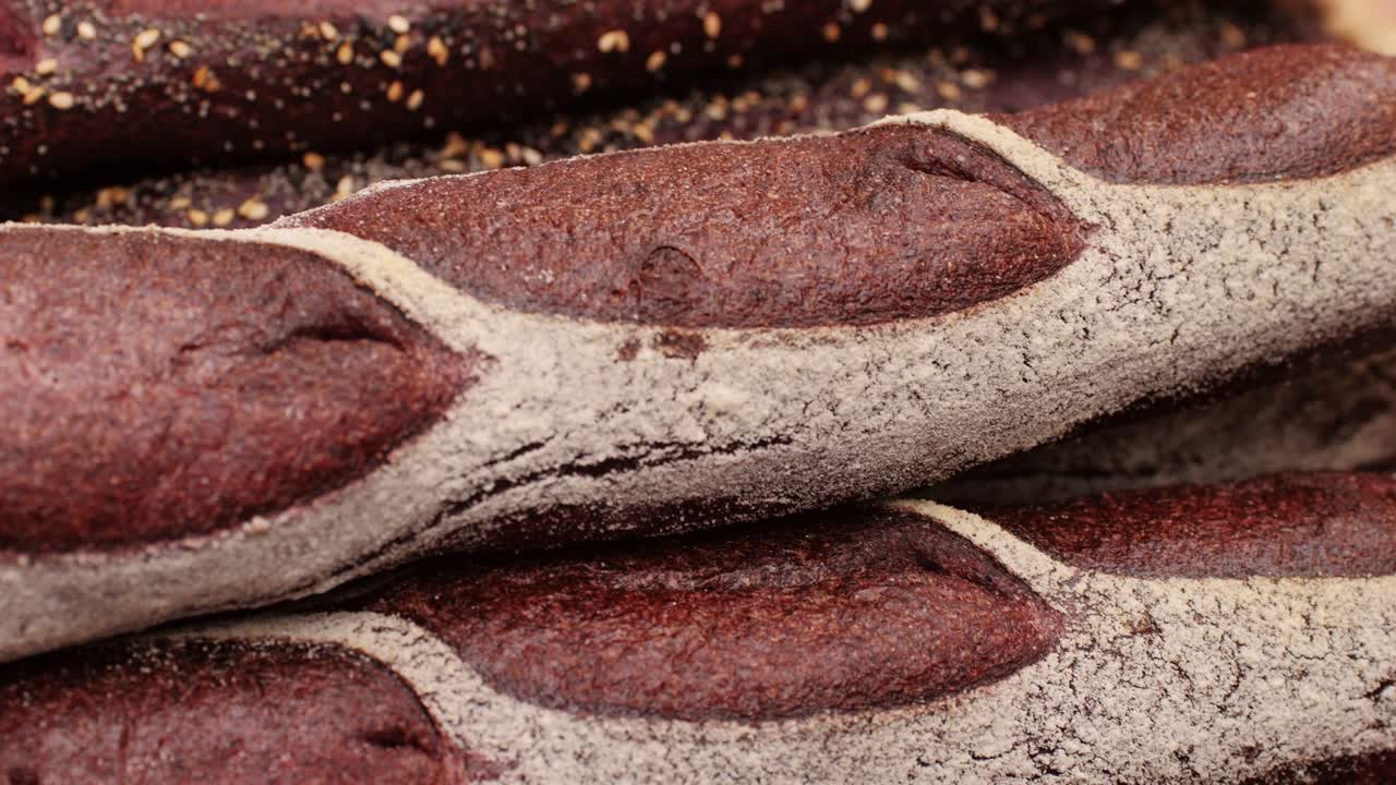 Fresh rye brown bread close-up. Artisan bread is making by skill bakers using natural and high-quality ingredients. Food with health and flavour benefits. Bakery shop and market