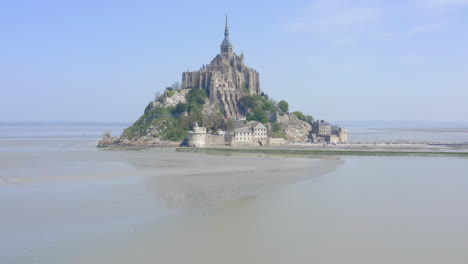 Push-in-pan-up-shoot-if-Mont-Saint-Michel-in-middle-of-slightly-dull-day