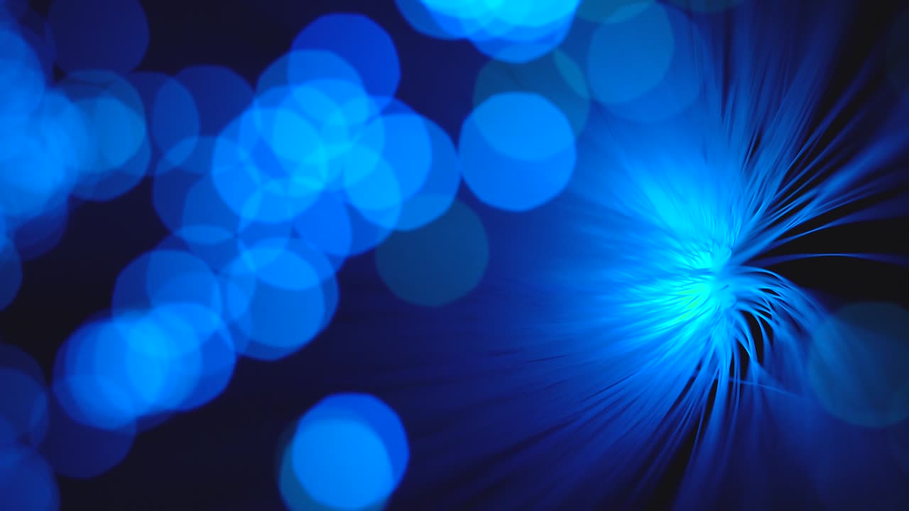 미세한 플라스틱 막대기에서 빛의 초점 밖으로 추상화