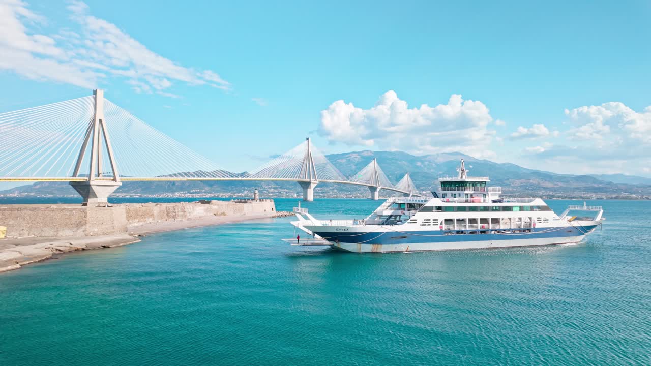 Ferry approaching Rio-Antirrio Bridge in Greece