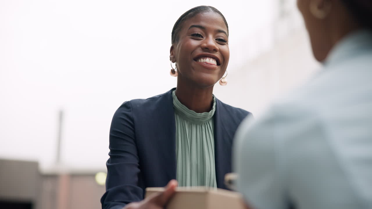 Businesswomen discussing work with a tablet