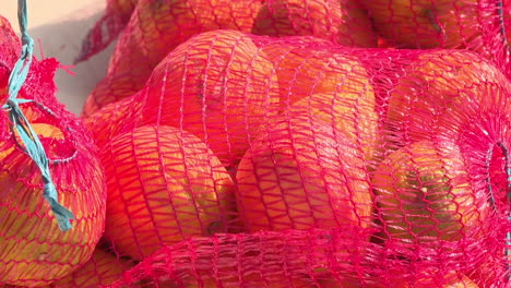 oranges in mesh bags