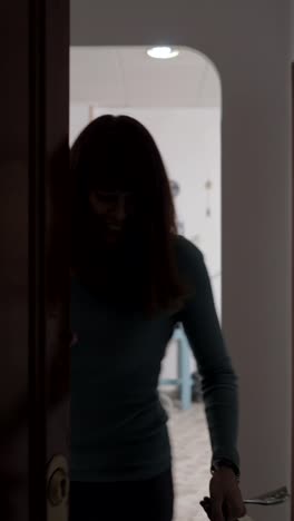 woman entering and viewing a workshop