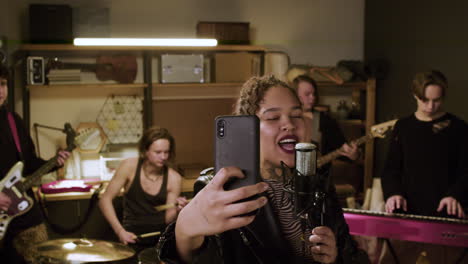 musical group in a studio