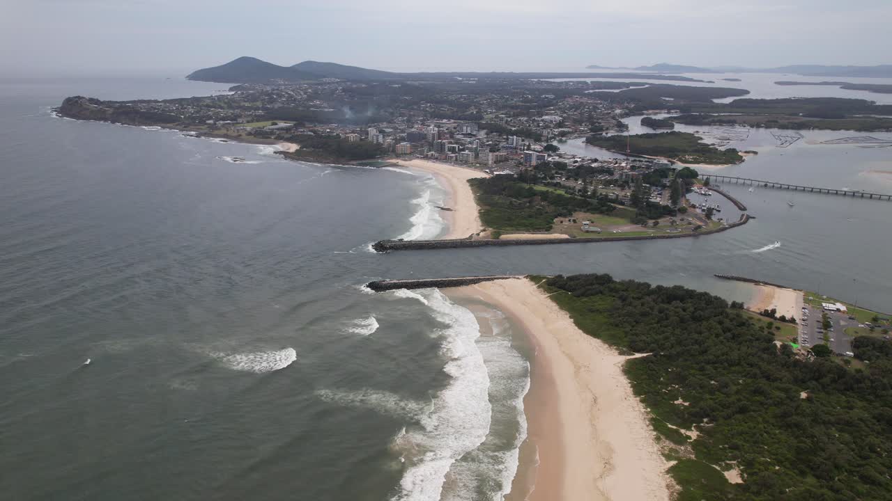 Coolongolook River Mouth Between Forster And Tuncurry Beach In New South Wales, Australia. aerial pullback shot