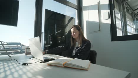 car service manager working at desk in office