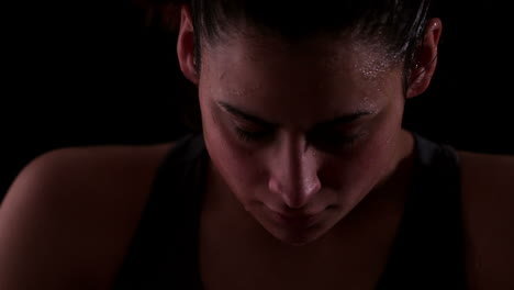 Sweaty-woman-looking-up-at-the-camera