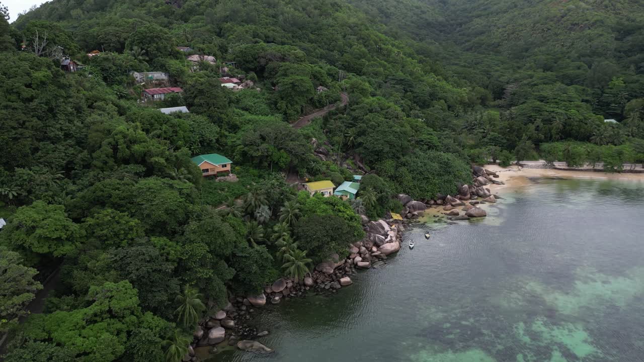 aerial of bungalow wooden house luxury resort in La Digue Island, Seychelles archipelago Indian Ocean travel holiday destination dream paradise
