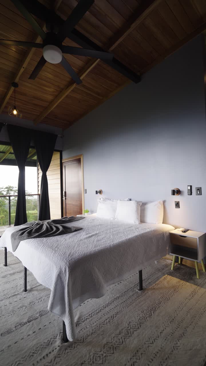 Modern Bedroom with White Bedding and Wood Ceiling