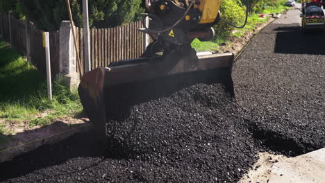 road resurfacing with excavator