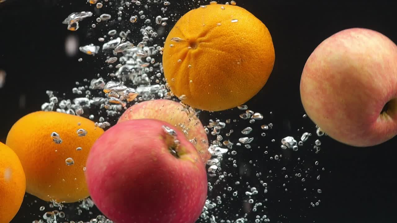 Fruits Splashing in Water