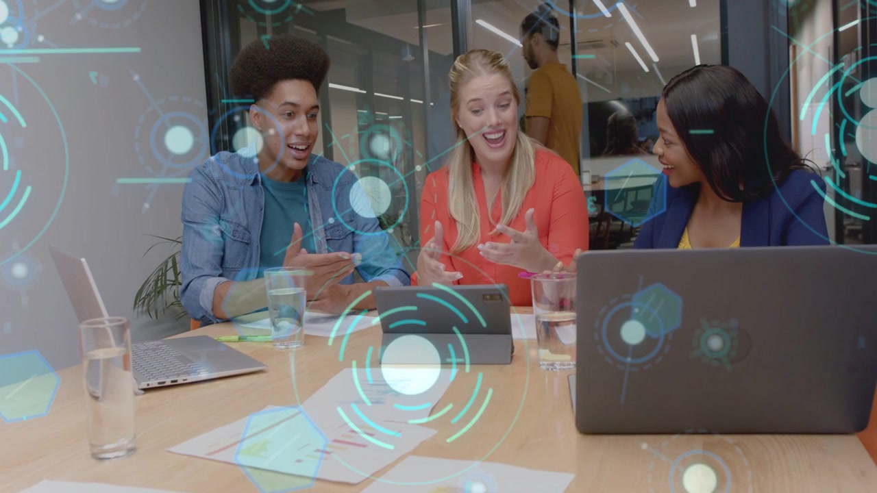 Center woman tapping tablet, business team pointing and laughing as HUD charts appearing, planning