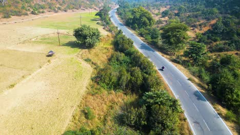 Aerial-view-sctty-Driving-on-Road