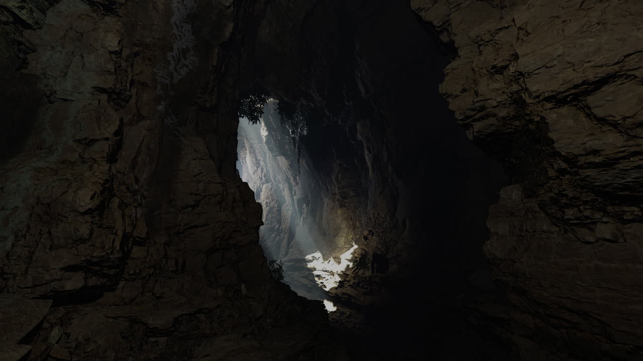 Light breaks through the rocks in a stunning cave formation