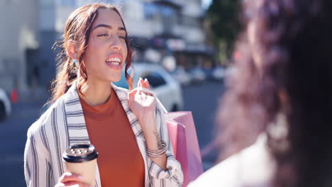 Women-friends,-shopping-and-talk-in-street