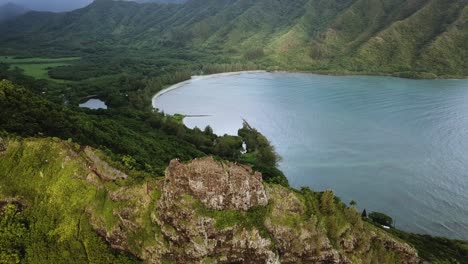 drone shot circling the top of the cliffs on the crouching lion hike on oahu, hawaii