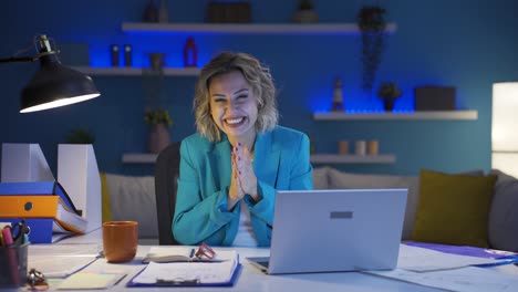 Home-office-worker-woman-looking-at-camera-clapping-and-getting-excited.