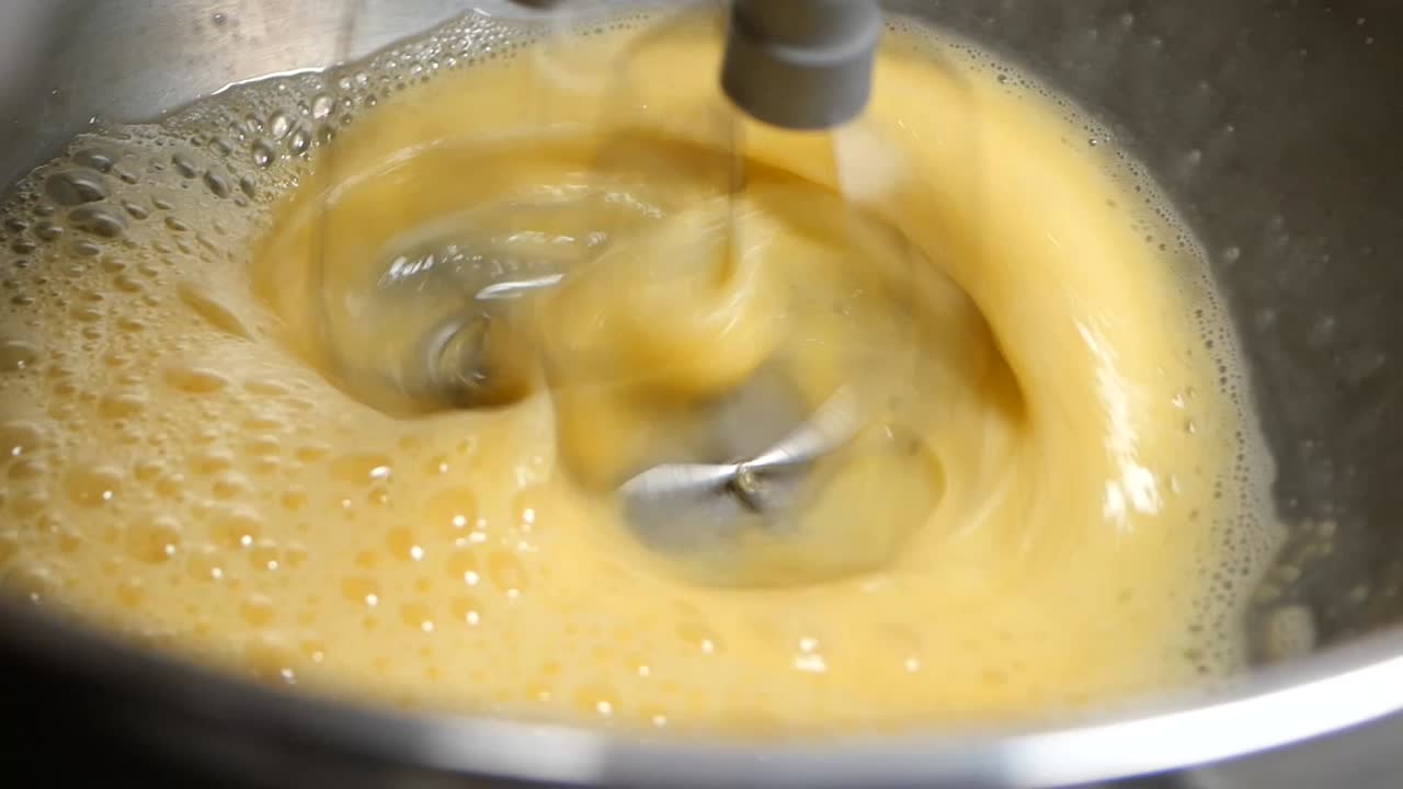 Mixing eggs with a kitchen appliance