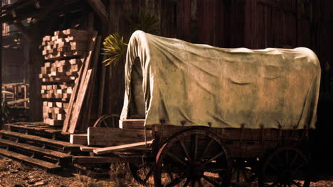 a covered wagon in a rural setting