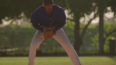 baseball player catching a ball during a match