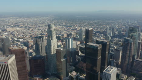 Wide-angle-view-of-Downtown-Los-Angeles,-California-Skyline-at-beautiful-blue-sky-and-sunny-day,-Aerial-Drone-Shot