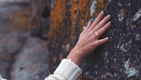 nature, touch and rock with woman hands feeling