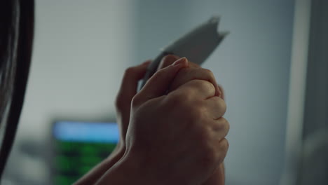 Woman-sitting-sick-patient-kissing-hand-closeup.-Hospital-heart-rate-monitor.