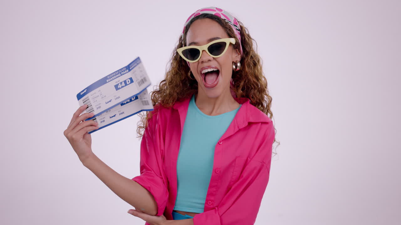 Happy young woman, plane ticket