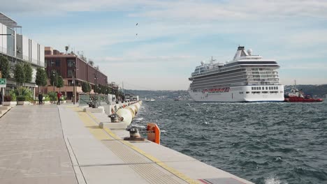 cruise ship sailing into a harbor in istanbul