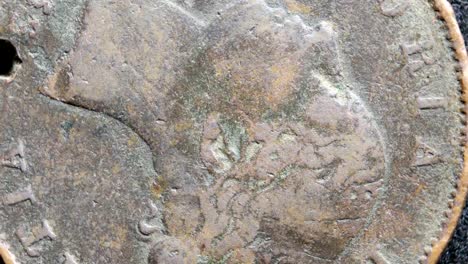 close up of very old coins