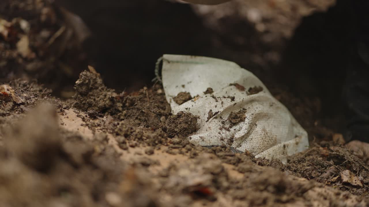 Discarded trash in the dirt