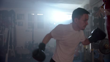 a-boxer-trains-in-a-training-room-with-a-punching-bag