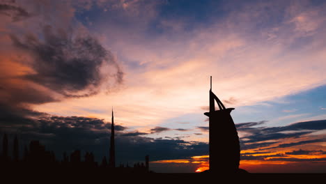 dubai skyline silhouette at sunset