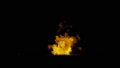 Big-fire-explosion-ground-sparks--60fps-from-the-bottom-of-the-screen,-black-background,-transparent-overlay-with-alpha-matte,-​​big-explosion-effect-video-Inflamed-debris-falling-to-ignition-place