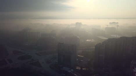 flying over a concrete living apartment area in east europa with many birds flying around the drone
