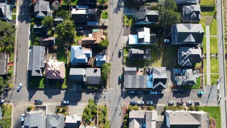 4K-aerial-drone-shot-floating-over-houses-at-Seaside,-Oregon-beach