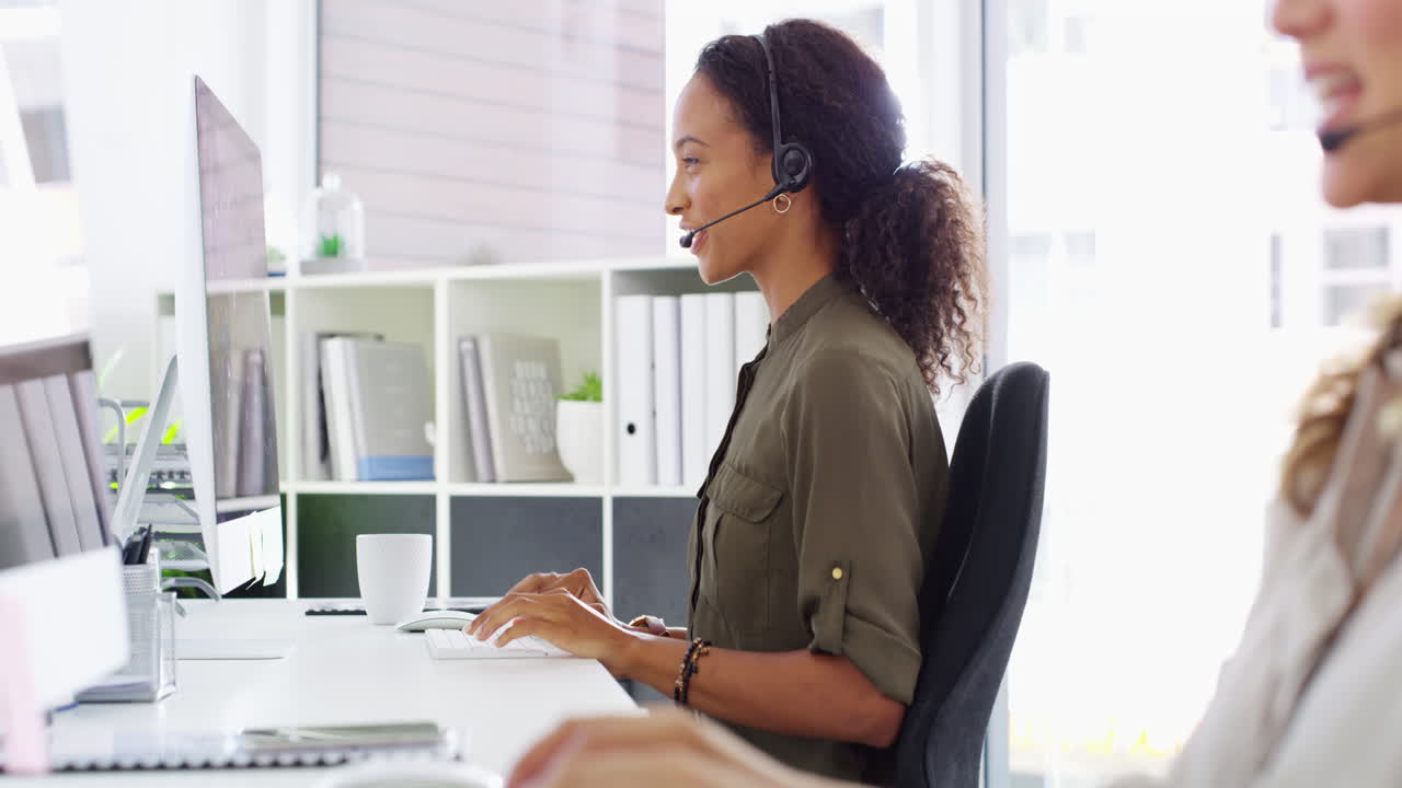 a young woman using a computer