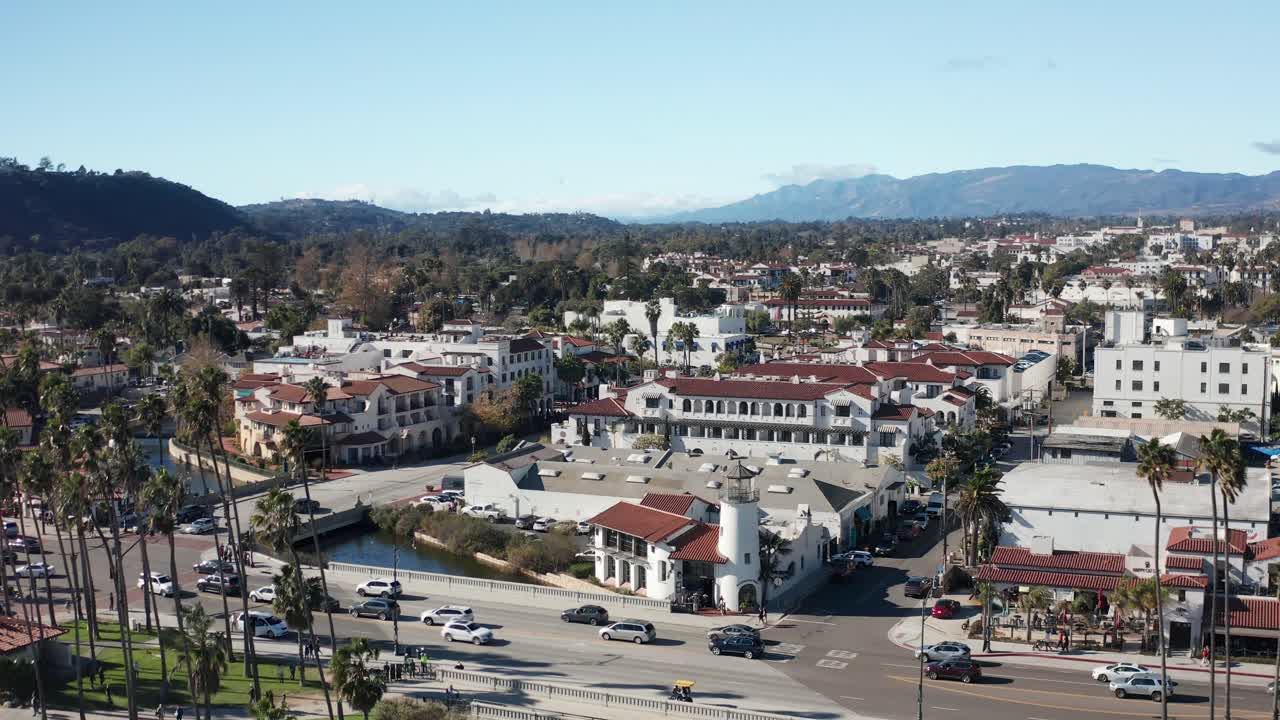 Aerial rising and panning shot of State Street in downtown Santa Barbara, California. 4K