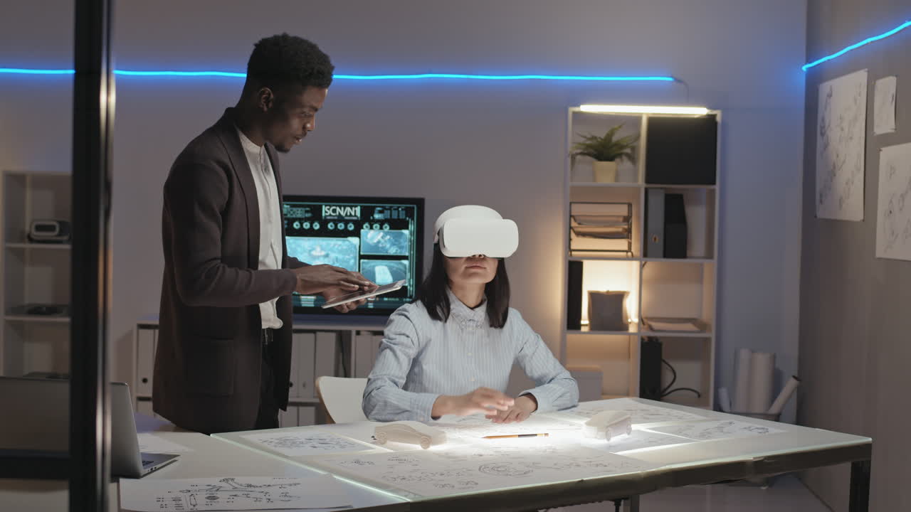 Slowmo of Engineers Working on Project in Virtual Reality