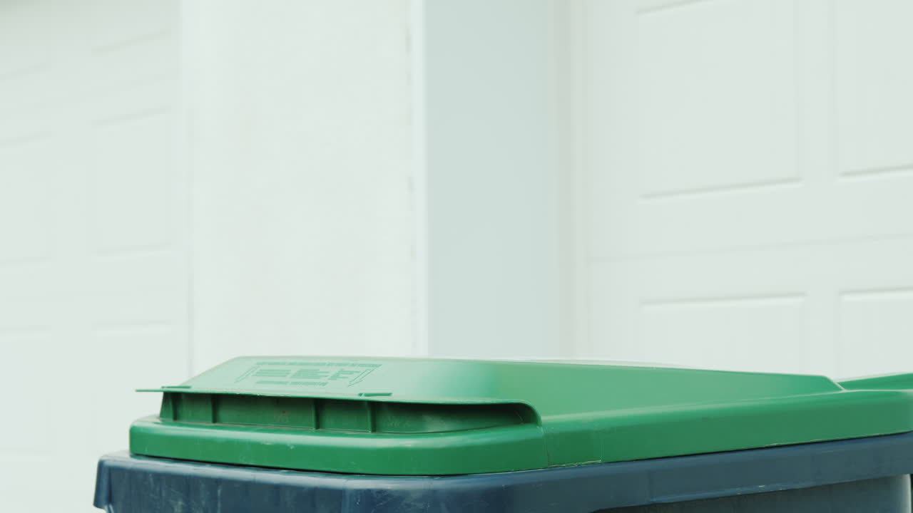 Homeowner Dumps Household Rubbish In A Container Near House 02