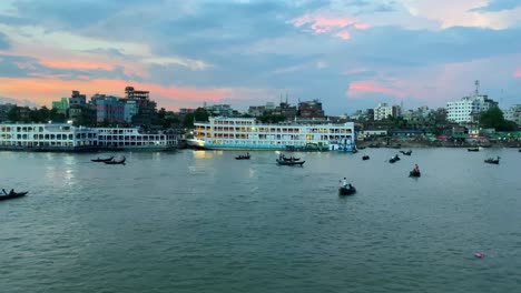 Scenic-view-of-cruise-ships-and-paddle-boats-on-pristine-blue-water