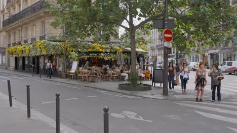 corner cafe in paris, france. slowed to half speed