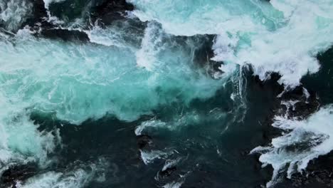 overhead view of the blue waters of the petrohue falls, southern chile