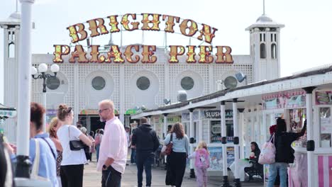 people interacting and walking on the pier