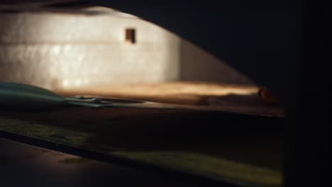 pizza baking in a wood-fired oven