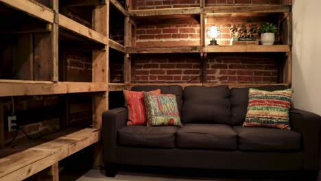 cozy urban loft lounge: a stylish and inviting space with industrial shelves, textured walls, and comfortable seating perfect for relaxation and social gatherings